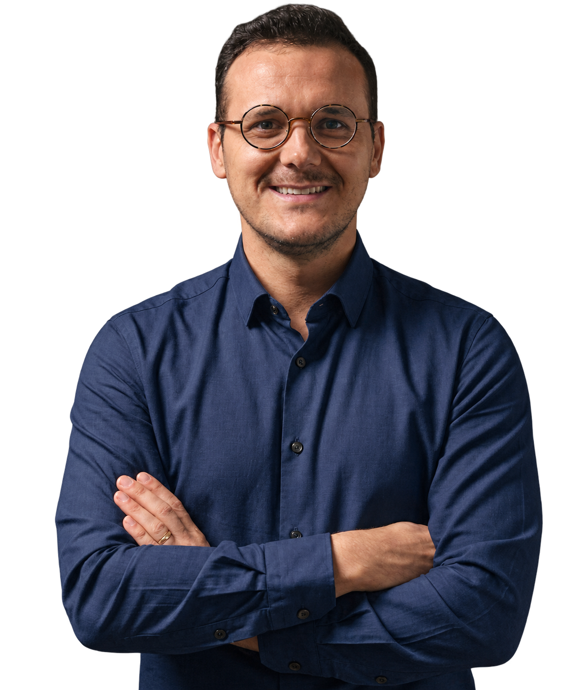 Sebastiano Facco, sorridente, con occhiali e camicia blu